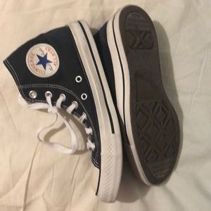 Black Converse Chuck Taylors high tops